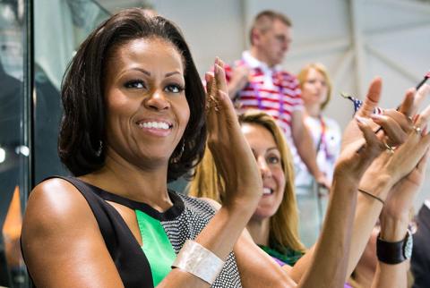 First Lady Michelle Obama watches the swimming finals and medal ceremonies at the Olympic Park Aquatics Center during the 2012 Summer Olympic Games in London, England, July 28, 2012. (P072812SH-0535)