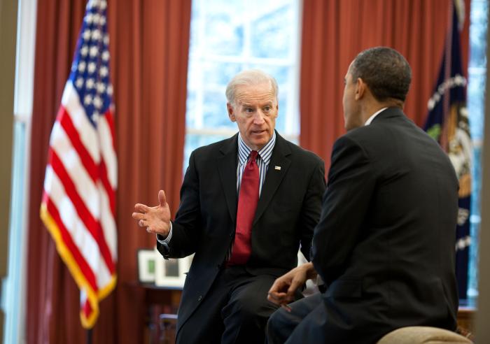 President Barack Obama talks with Vice President Joe Biden in the Oval Office in between meetings to discuss the ongoing budget negotiations on April 8, 2011.