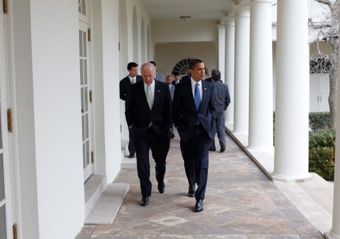 President Obama walks to the Oval Office along the Colonnade with Vice President Joe Biden, Feb. 3, 2009.