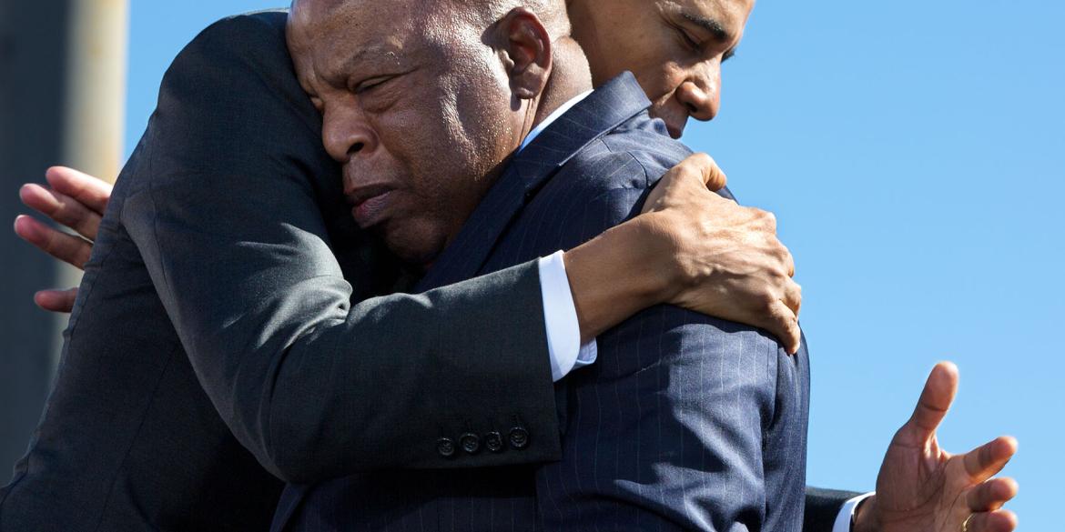 President Barack Obama hugs Rep. John Lewis, D-Ga., after his introduction during the event to commemorate the 50th Anniversary of Bloody Sunday and the Selma to Montgomery civil rights marches, at the Edmund Pettus Bridge in Selma, Ala., March 7, 2015.