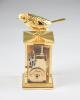 A mechanical bird music clock made by music box atelier Reuge of Sainte-Croix, Switzerland, and modeled after a common chiffchaff. Gift of the State of Qatar. FO111279_obverse_BHO_resize