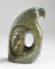 A soapstone sculpture by First Nations artist Leo Arcand depicting the profile of an eagle with half of a man's face in the center. Gift of Canada. FO116558_complete_bho_resize
