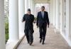 President Barack Obama and President Hamid Karzai of Afghanistan walk on the Colonnade of the White House following their meeting in the Oval Office, January 11, 2013.