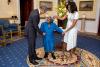 President Barack Obama and First Lady Michelle Obama greet 106-Year-Old Virginia McLaurin during a photo line in the Blue Room of the White House prior to a reception celebrating African American History Month, February 18, 2016.