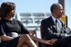 President Barack Obama and First Lady Michelle Obama hold hands as they listen to Rep. John Lewis during an event to commemorate the 50th Anniversary of Bloody Sunday and the Selma to Montgomery civil rights marches, at the Edmund Pettus Bridge in Selma, 