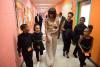 First Lady Michelle Obama and Kerry Washington walk with students at Savoy Elementary School in Washington, D.C., May 24, 2013. Savoy is one of eight schools selected for the President's Committee on the Arts and the Humanities (PCAH) Turnaround Arts Init
