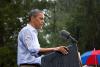 President Barack Obama delivers remarks in the rain at a grassroots campaign event at Walkerton Tavern & Gardens in Glen Allen, Virginia, July 14, 2012.