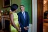 President Barack Obama and First Lady Michelle Obama wait in the Green Room before hosting a Diplomatic Corps Reception in the East Room of the White House, October 5, 2010.