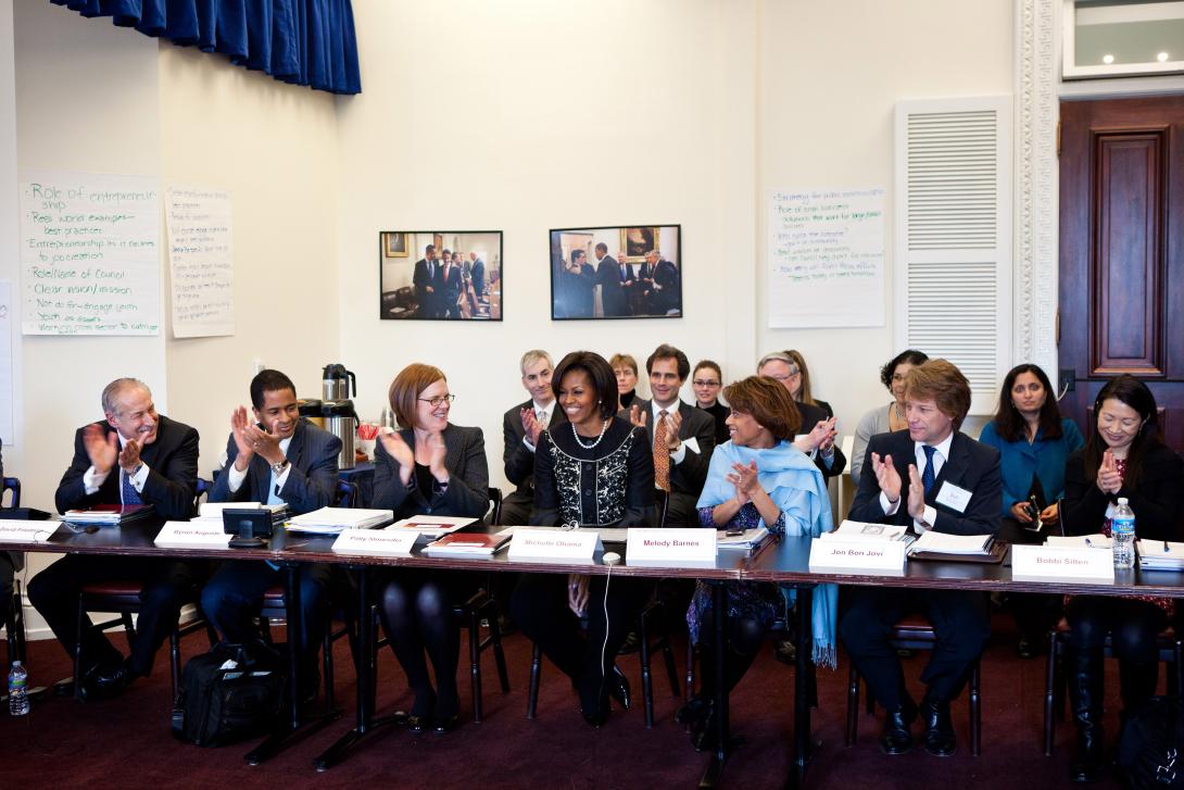 First Lady Michelle Obama and Melody Barnes, Assistant to the President and Domestic Policy Council Director, third from right, meet with the Council on Community Solutions in the Eisenhower Executive Office Building of the White House, February 4, 2011.