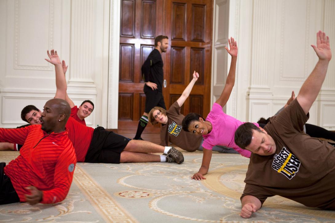 First Lady Michelle Obama participates in a taping for the “Biggest Loser" in the East Room of the White House, February 16, 2012. 