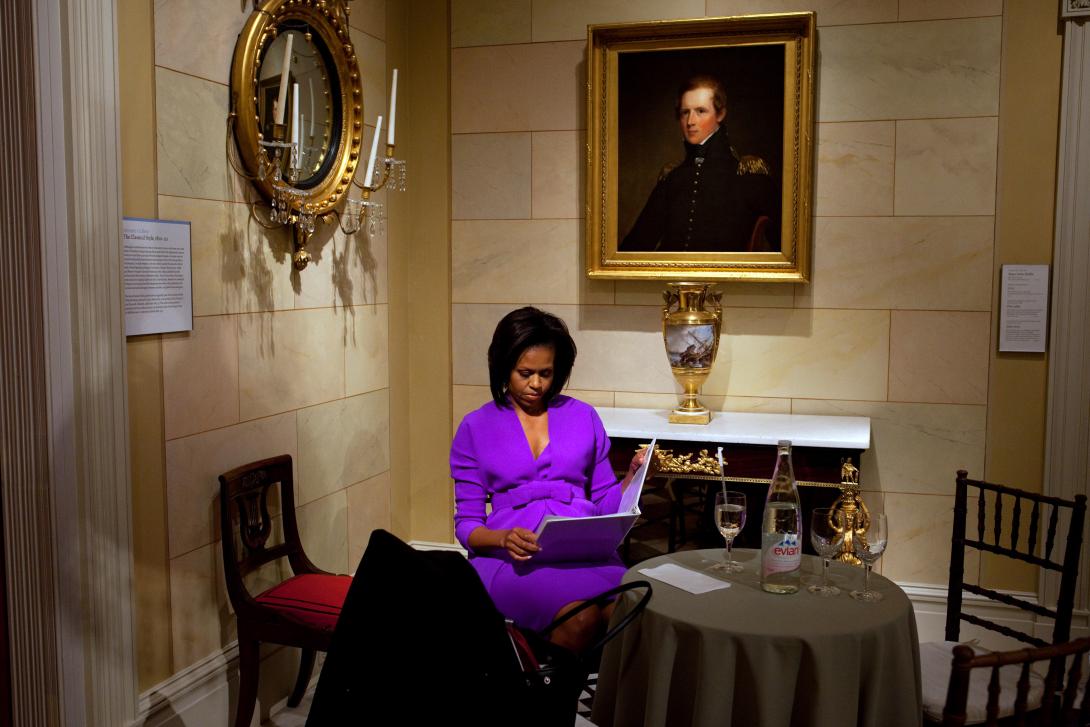 First Lady Michelle Obama looks over her speech before speaking at the Metropolitan Museum of Art in New York City, May 18, 2009.