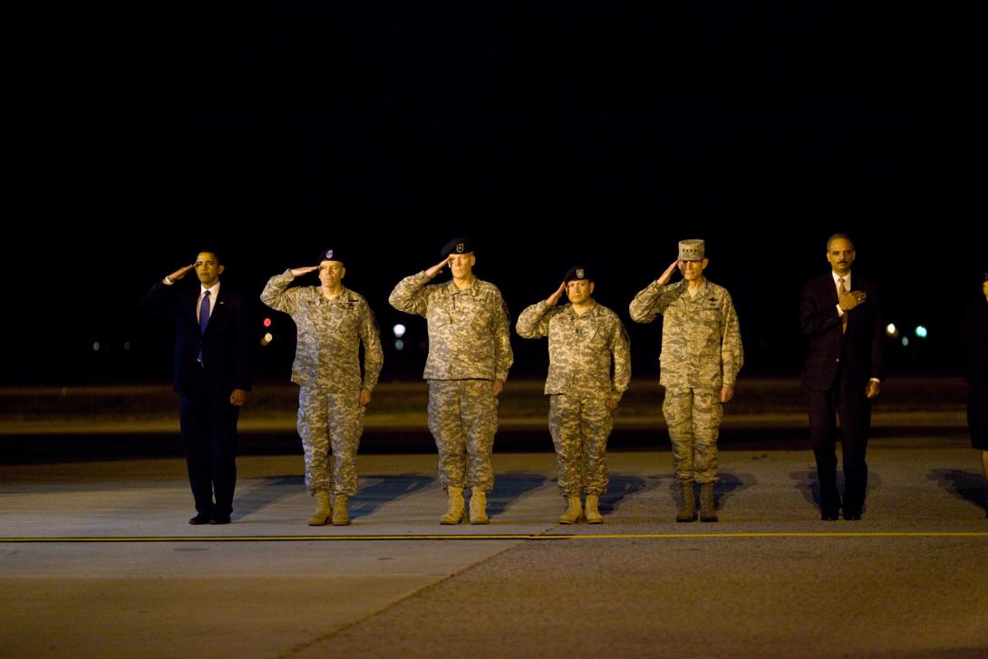 President Barack Obama attends a ceremony at Dover Air Force Base in Dover, Delaware, October 29, 2009, for the dignified transfer of 18 U.S. personnel who died in Afghanistan. 