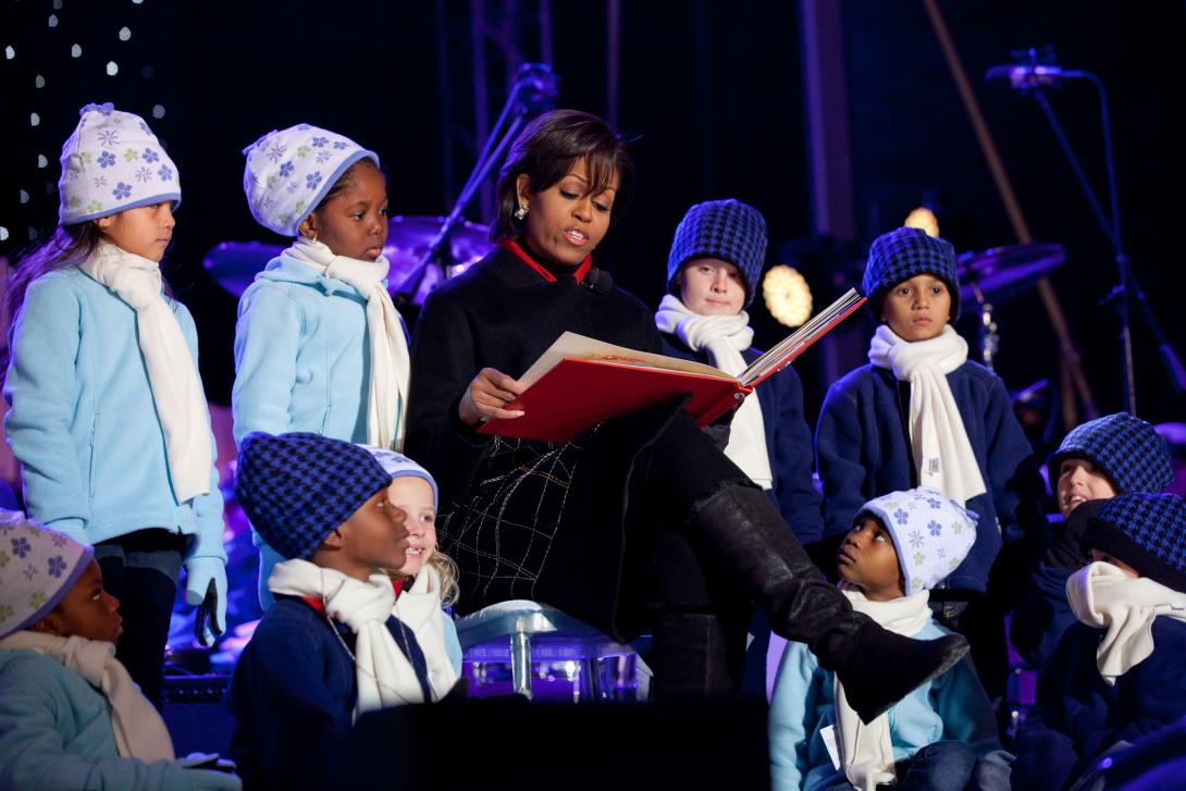 First Lady Michelle Obama reads “‘Twas the Night Before Christmas” at the National Christmas Tree Lighting Ceremony on the Ellipse in Washington, D.C., December 9, 2010.