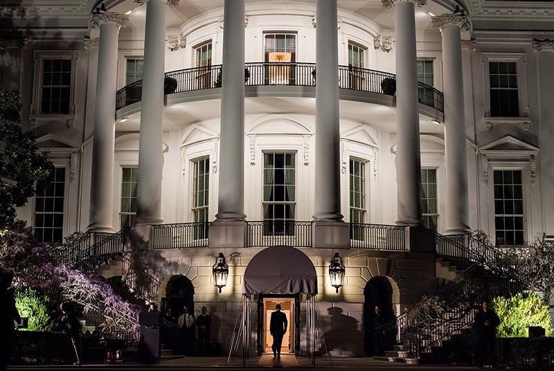 President Barack Obama enters the South Portico of the White House following his arrival aboard Marine One on the South Lawn, March 30, 2012. (P033012PS-0796)